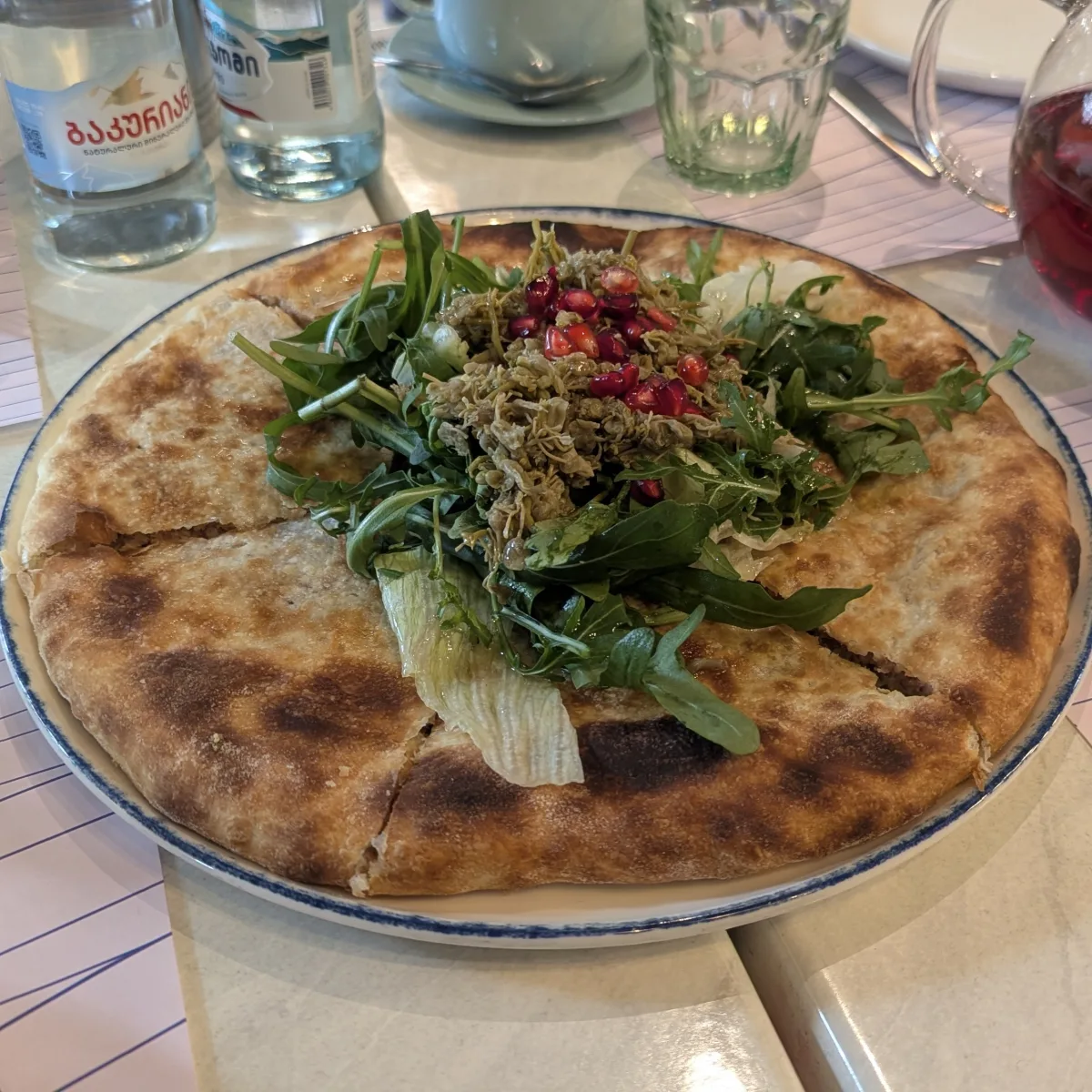 Lobiani (Georgian bean bread) photographed on kitchen counter